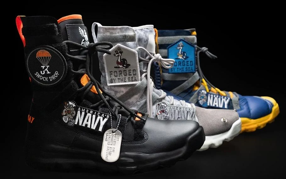 The three custom Nike SEAL boots with the Shock Drop, Forged by the Sea, and America’s Navy frog patches